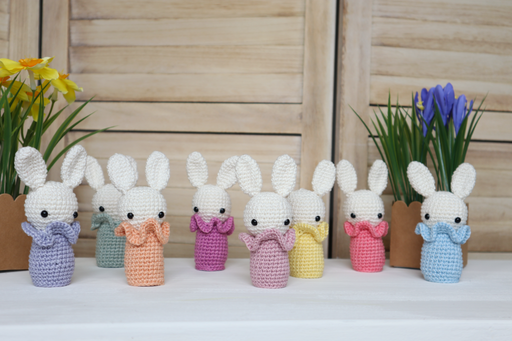 colourful crochet bunny decors displayed on shelf