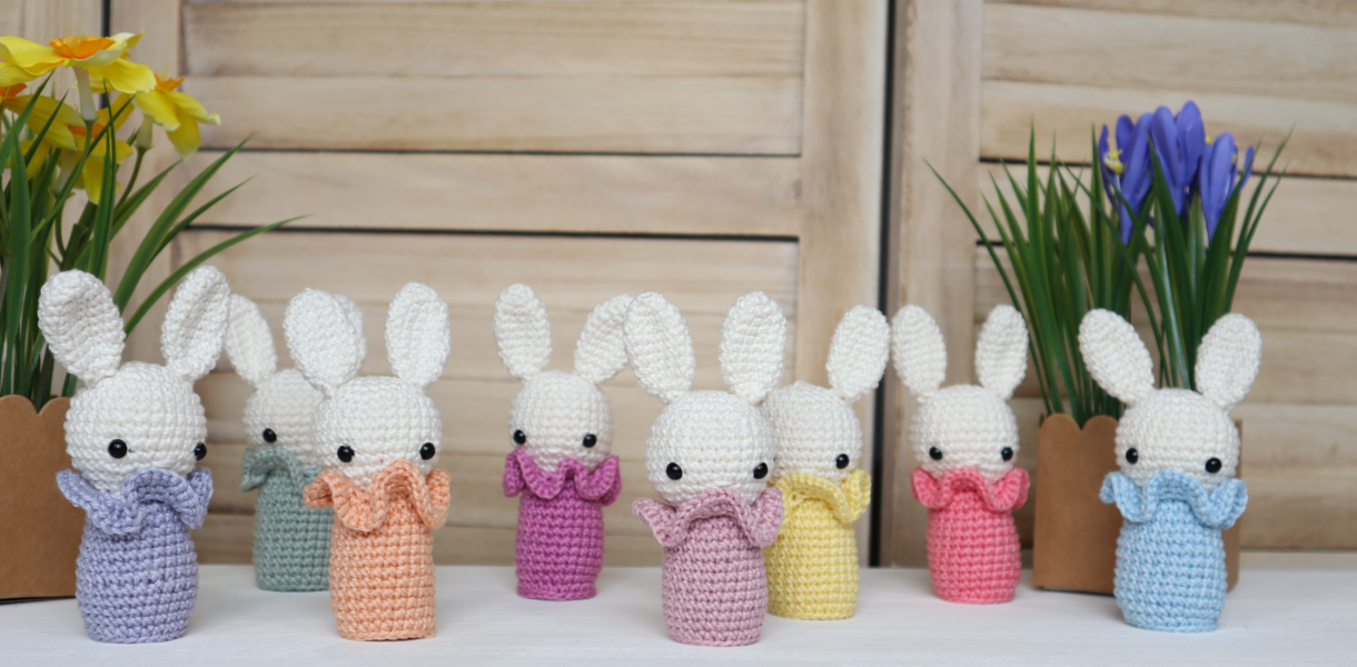 colourful crochet bunny decors displayed on shelf